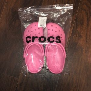 Pink crocs